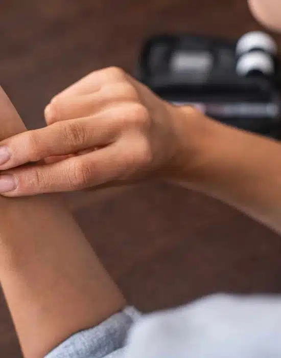 cropped view of woman checking pulse at home