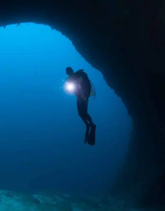 diver in a cave
